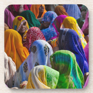 Women in colourful saris gather together coaster