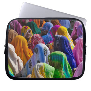 Women in colourful saris gather together laptop sleeve