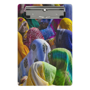 Women in colourful saris gather together mini clipboard