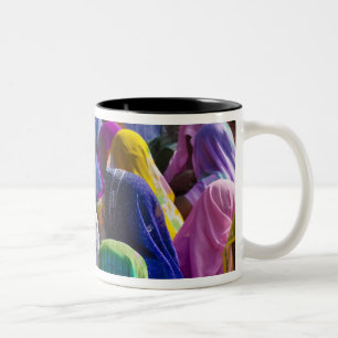 Women in colourful saris gather together Two-Tone coffee mug
