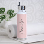 Womens Stylish Blush Pink Script Personalized Water Bottle<br><div class="desc">Stay hydrated during you gym workout with this Women's Stylish Blush Pink Script Personalized Water Bottle. It is trendy modern designed with a pastel pink background around the bottle. Name is in light grey hand script lettering vertical on centre front. Perfect gift idea for her! CLICK PERSONALIZE TEMPLATE OPTION AND...</div>