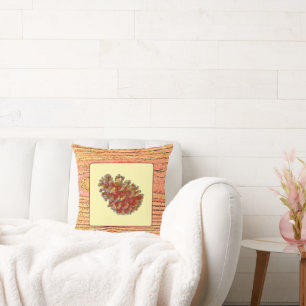 wood imitation and pinecone throw pillow