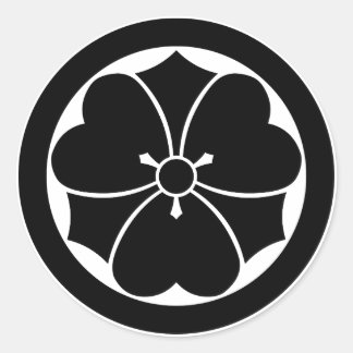 Wood sorrel with swords in circle classic round sticker