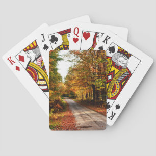 Wood trail with fall foliage playing cards