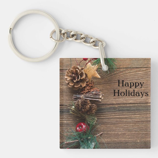 wooden background with pine cones      keychain (Front)