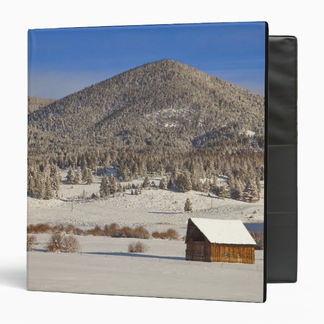 Wooden barn sits in snow near the Boulder Binder (Front/Inside)