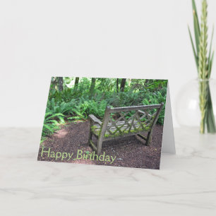 Wooden bench in park card