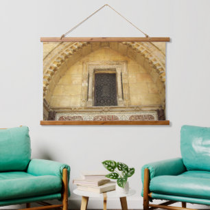 Wooden brown carved window on Coptic church in Hanging Tapestry