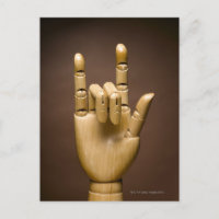 Wooden hand index and small finger extended,