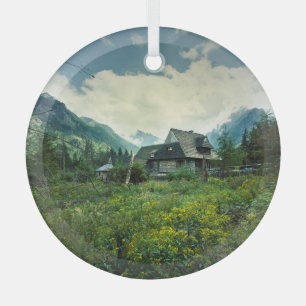 Wooden house, mountain nature scenery. glass ornament