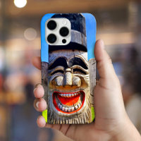 Wooden totem laughing teeth face photo bold funny