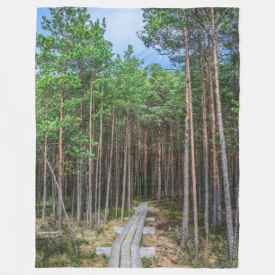 Wooden trail in pine forest fleece blanket