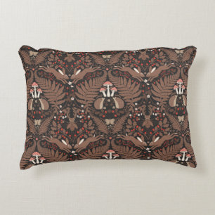 Woodland animals and plants in red and brown accent pillow