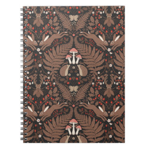 Woodland animals and plants in red and brown notebook