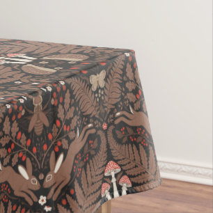 Woodland animals and plants in red and brown tablecloth