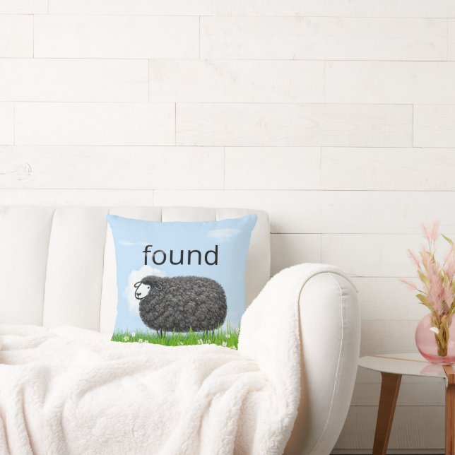 Wooly Black Sheep In Grass with "Found" Text Throw Pillow (Couch)