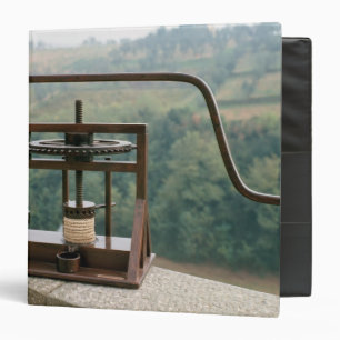 Working model of an olive press binder