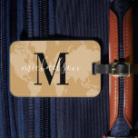 World Traveller Cognac Map Custom Monogram Name Lu Luggage Tag<br><div class="desc">Travel the world in style! This elegant and modern luggage tag features a cognac tan brown map of the world background with black and white custom monogram that can be personalized with your first or last name and initial letter.</div>