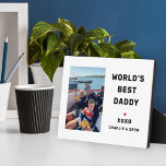 Worlds Best Daddy Custom Family Photo Plaque<br><div class="desc">A sweet white plaque sign featuring "World's Best Daddy" in bold type with a custom photo, "XOXO, " and personalized children's names with a heart accent. All text and the photo are fully customizable — a heartfelt keepsake gift for Daddy on Father's Day, his birthday, or any occasion the kids...</div>