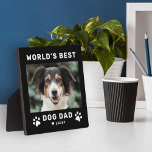 Worlds Best Dog Dad Black Square Custom Photo Plaque<br><div class="desc">This simple and modern square custom photo plaque easel sign features a portrait-shaped photo space with custom "The World's Best Dog Dad" wording with name(s) of pet puppy dog(s) in modern black style with cute paw prints, heart accent, and personalization of the dog's name. Makes a great Father's Day gift...</div>