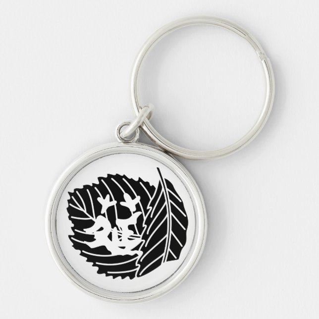 Worm-eaten folded oak leaf crest keychain (Front)
