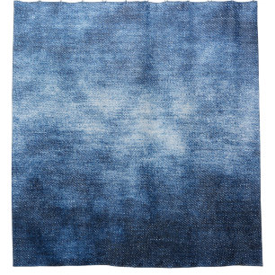 Worn denim fabric, textured background.