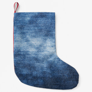 Worn denim fabric, textured background. small christmas stocking