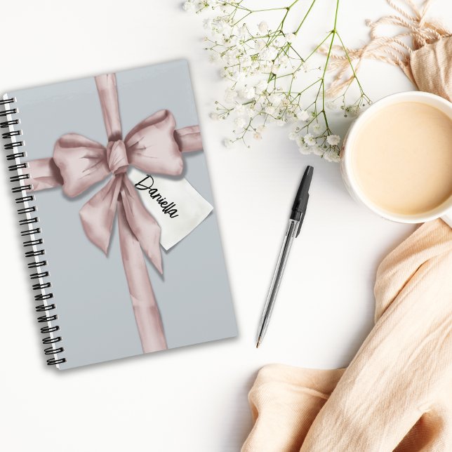 Wrapped in a pink bow notebook (Creator Uploaded)