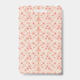 Wrapping paper with a repeating pattern of red, or badge