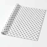 Wrapping paper with black dots on white background<br><div class="desc">This is a cute wrapping paper that could be used for any occasion.  It features black dots on a white background.</div>