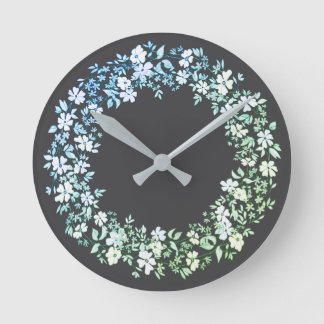 Wreath of flowers and leaves round clock