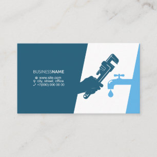 Wrench in hand of plumber business card