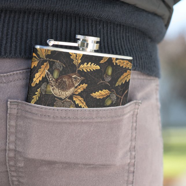 Wrens and acorns on black hip flask (In Situ)
