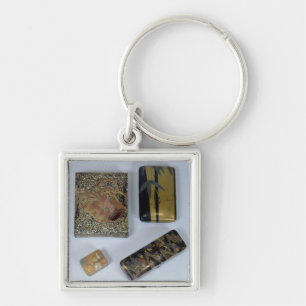 Writing case decorated with a cockerel keychain
