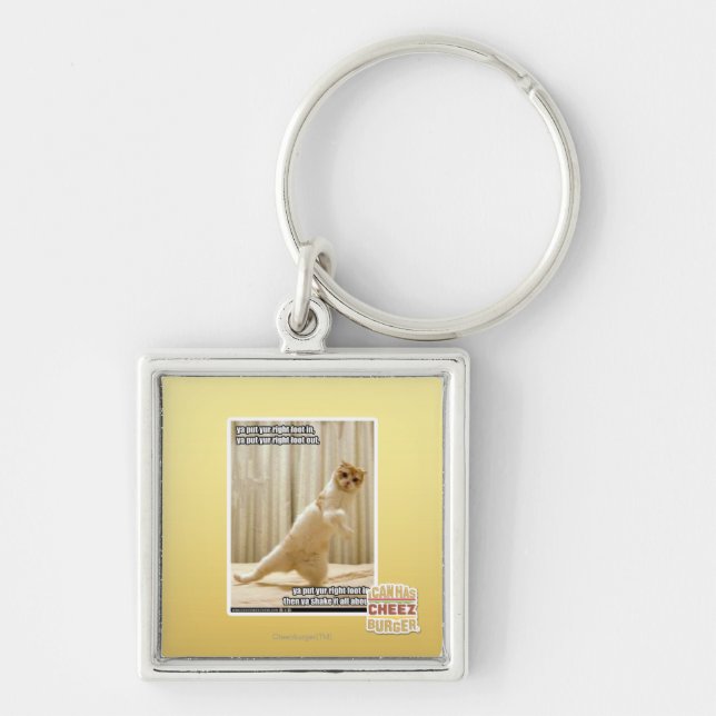 Ya put yur right foot in, ya put yur right foot ou keychain (Front)