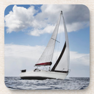 Yacht Sailing In Open Sea Coaster