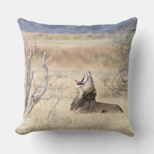 Yawning lion throw pillow