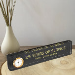 Years of Service Employee Awards Desk Name Plate<br><div class="desc">This years of service employee award features a clock on the left side of a desk name plate. There is a black background on which you can customize the years of service and the name of the person in gold. If you are looking for service awards ideas, this may be...</div>
