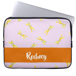Yellow airplanes on purple laptop sleeve
