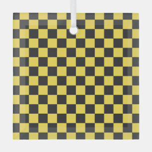 Yellow and black checkerboard pattern glass ornament