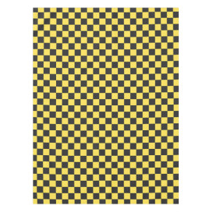 Yellow and black chequerboard pattern tablecloth