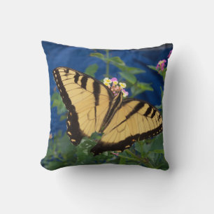 Yellow and black swallowtail butterfly on a throw pillow