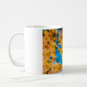 Yellow and blue petaled flower coffee mug