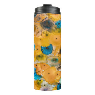 Yellow and blue petaled flower thermal tumbler
