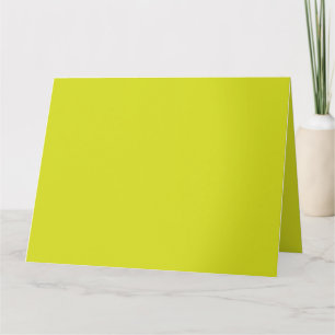Yellow and orange geometric shapes are arranged ag card