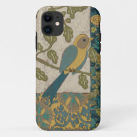 Yellow and Teal Blue Bird Perched on a  Branch