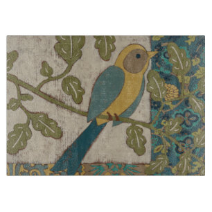 Yellow and Teal Blue Bird Perched on a  Branch Cutting Board