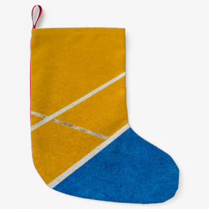 Yellow area rug small christmas stocking