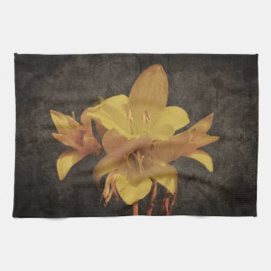 Yellow Asiatic lily on old grunged canvas backgrou Kitchen Towel