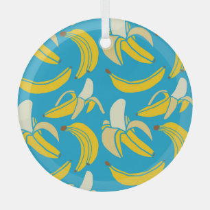 Yellow bananas, blue background pattern glass ornament
